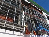 Installing curtain wall mullions at the South Elevation.jpg
